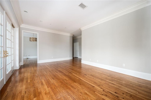 3657 Peachtree Rd NE Unit 4A, Atlanta, GA 30319 - spare room with crown molding and wood finished floors