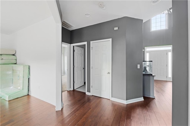 interior space with dark hardwood / wood-style flooring