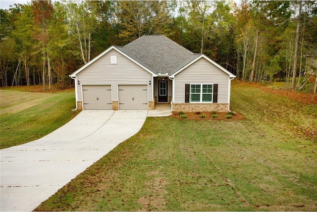 view of front of home with a garage and a front lawn