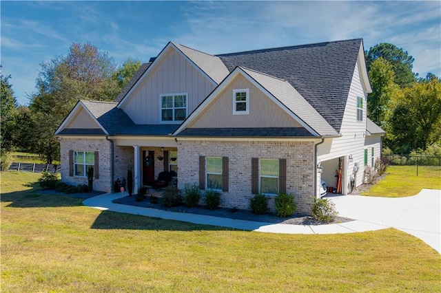 view of front of house featuring a garage and a front yard