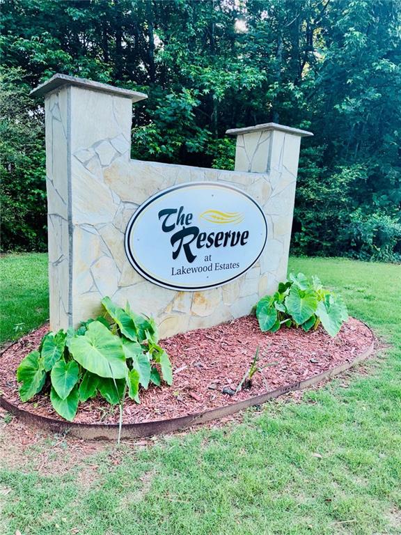 225 Colser Dr, Covington, GA 30016 - community / neighborhood sign featuring a lawn