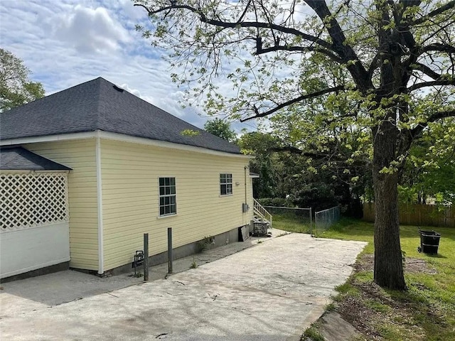 view of property exterior featuring a patio area