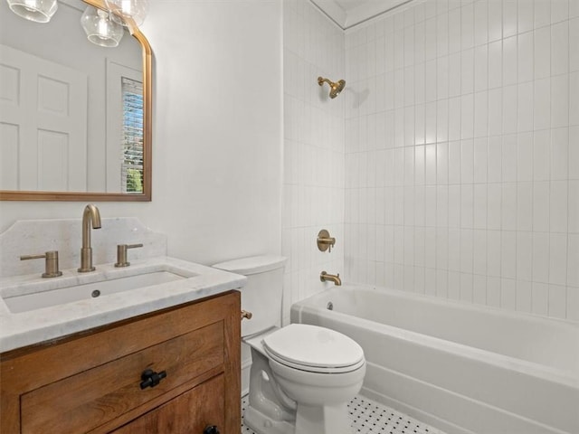 bathroom featuring shower / bathing tub combination, vanity, and toilet