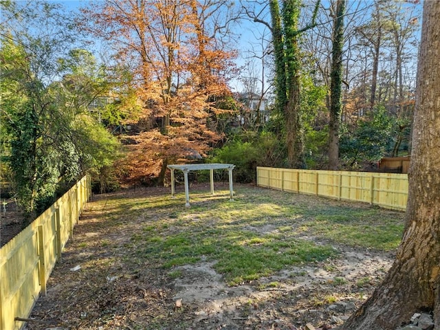 view of yard featuring fence