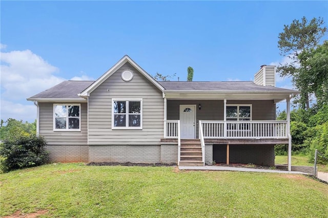 28 Fawn Ct, Sharpsburg, GA 30277 - ranch-style house with a front yard, a chimney, and a porch