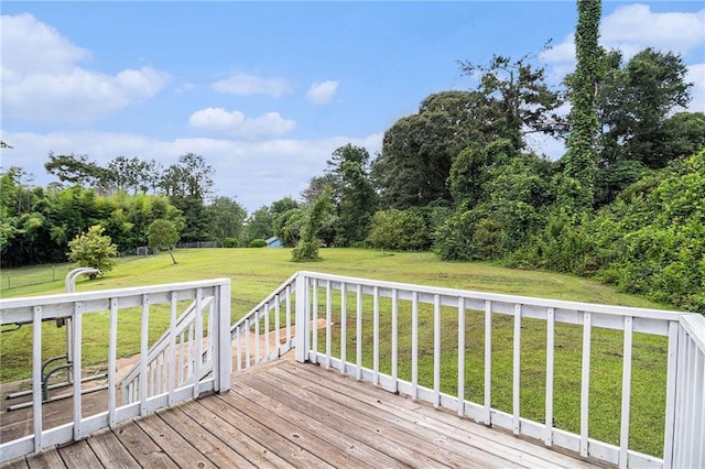 28 Fawn Ct, Sharpsburg, GA 30277 - wooden deck featuring a yard