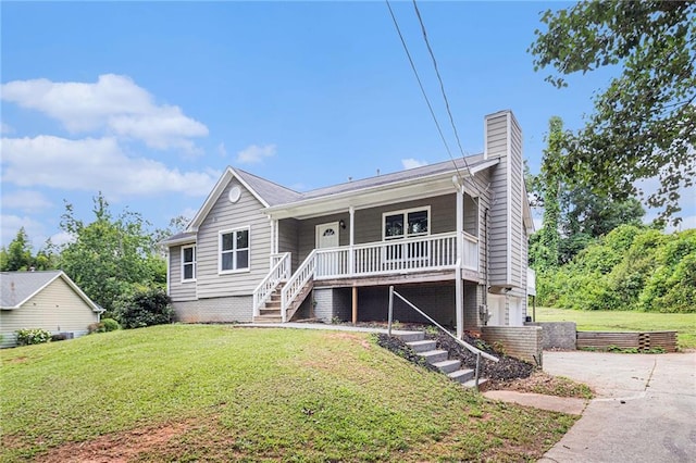 28 Fawn Ct, Sharpsburg, GA 30277 - ranch-style home featuring stairs, a porch, a chimney, a front lawn, and driveway