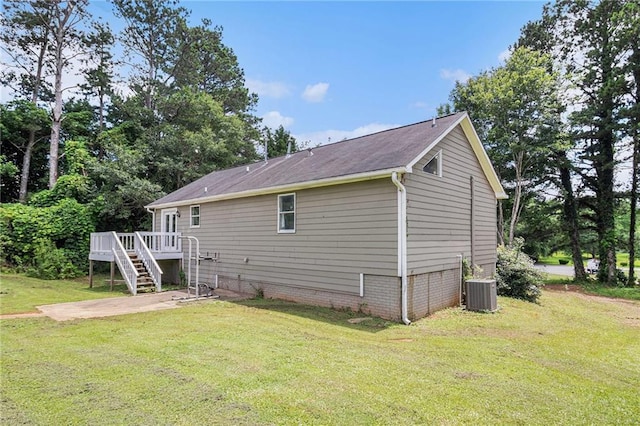 28 Fawn Ct, Sharpsburg, GA 30277 - view of property exterior with a wooden deck, stairs, a yard, and a patio