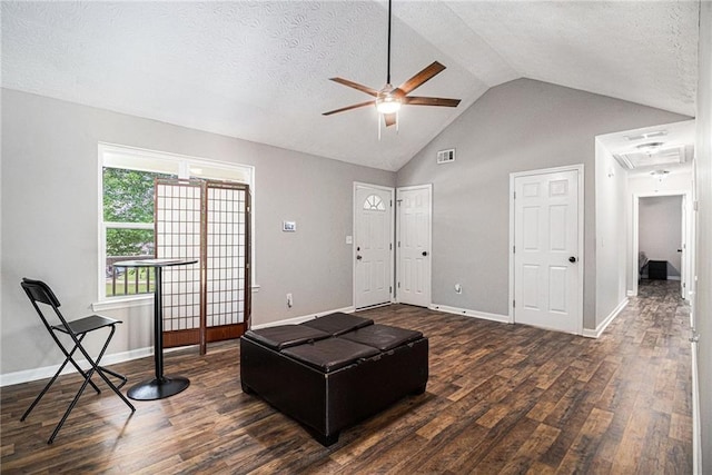 28 Fawn Ct, Sharpsburg, GA 30277 - living room with ceiling fan, attic access, wood finished floors, a textured ceiling, and high vaulted ceiling