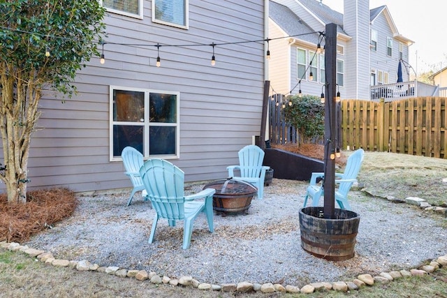 view of patio featuring an outdoor fire pit