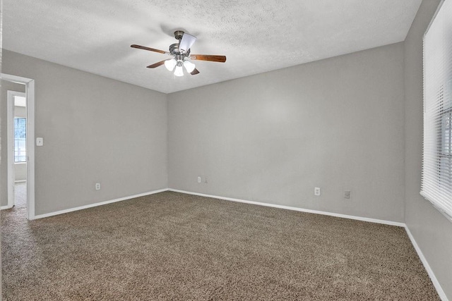 1234 Wellhouse Walk, Stone Mountain, GA 30088 - carpeted spare room with ceiling fan and a textured ceiling