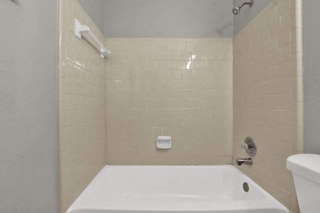 1234 Wellhouse Walk, Stone Mountain, GA 30088 - bathroom featuring toilet and shower / washtub combination