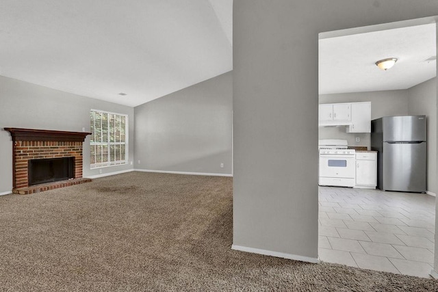 1234 Wellhouse Walk, Stone Mountain, GA 30088 - unfurnished living room featuring light carpet and a brick fireplace