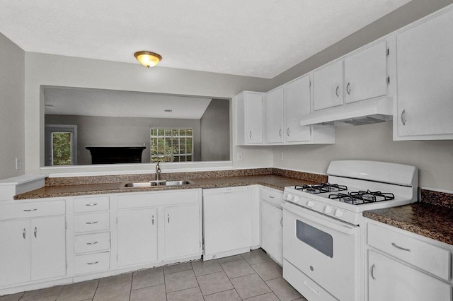 1234 Wellhouse Walk, Stone Mountain, GA 30088 - kitchen featuring white appliances, under cabinet range hood, white cabinets, and dark countertops