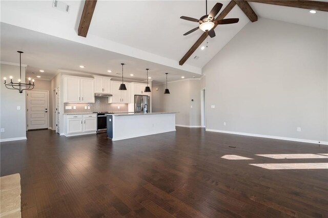 unfurnished room with high vaulted ceiling, dark wood-type flooring, a wealth of natural light, and ceiling fan