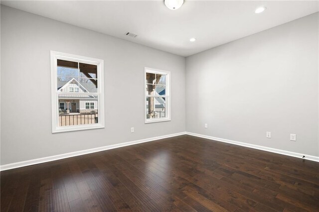 foyer entrance featuring dark hardwood / wood-style flooring and ornamental molding