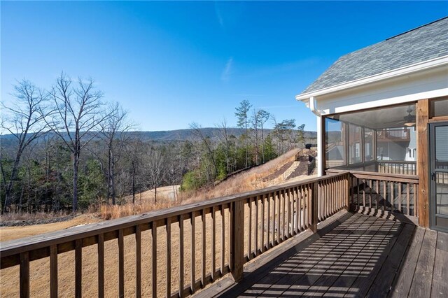 back of house featuring a yard, a deck, ceiling fan, and a patio area