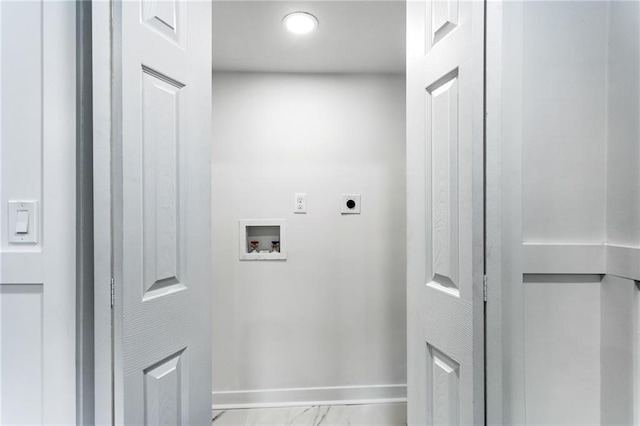 1150 Rankin St Unit 6H, Stone Mountain, GA 30083 - washroom featuring hookup for an electric dryer, hookup for a washing machine, and marble finish flooring
