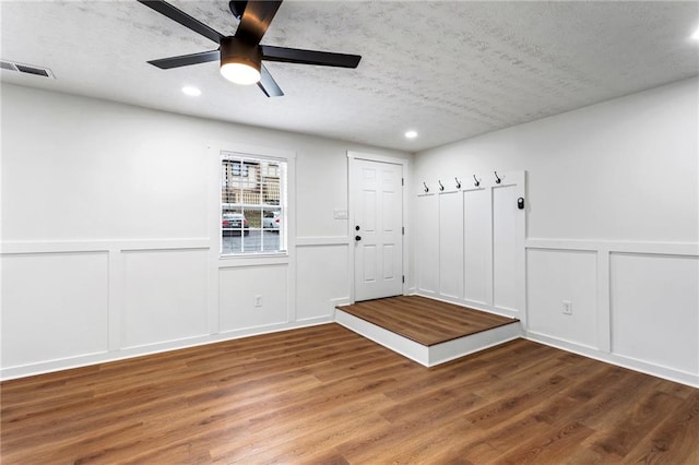 1150 Rankin St Unit 6H, Stone Mountain, GA 30083 - mudroom featuring a decorative wall, wood finished floors, a ceiling fan, recessed lighting, and a textured ceiling