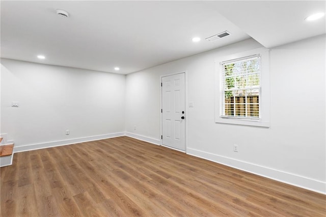 1150 Rankin St Unit 6H, Stone Mountain, GA 30083 - spare room with a smoke detector, wood finished floors, and recessed lighting
