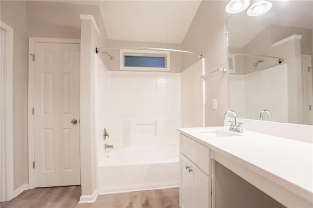 7113 Ambercrest Ct, Austell, GA 30168 - bathroom with bathing tub / shower combination, wood finished floors, and vanity