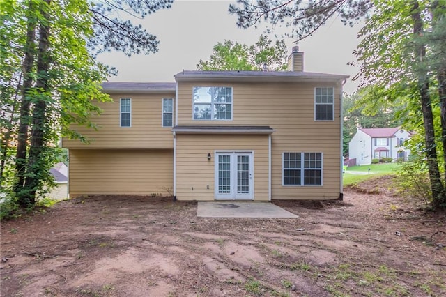 7113 Ambercrest Ct, Austell, GA 30168 - rear view of house featuring a patio and a chimney