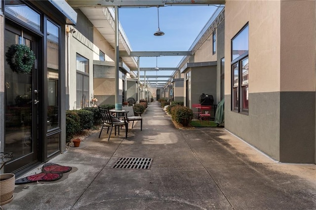 view of patio with a lanai