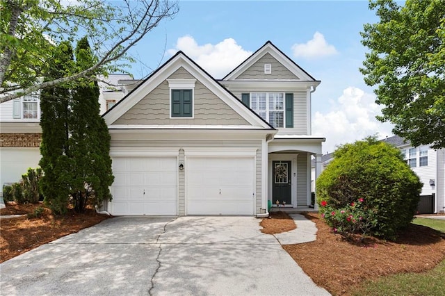 212 Regent Sq, Woodstock, GA 30188 - traditional-style house featuring a garage and driveway