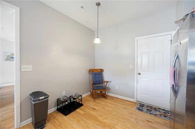 212 Regent Sq, Woodstock, GA 30188 - living area featuring light wood-style floors and baseboards