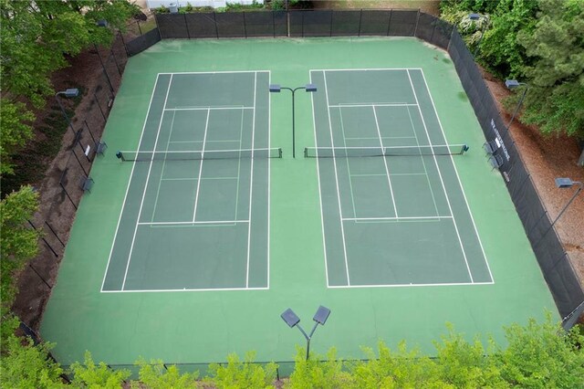 212 Regent Sq, Woodstock, GA 30188 - view of tennis court featuring fence