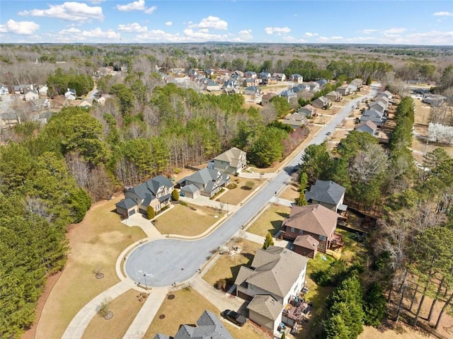 birds eye view of property with a residential view