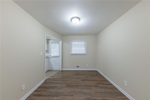 3390 Glenview Cir SW, Atlanta, GA 30331 - spare room with dark wood-style floors and baseboards