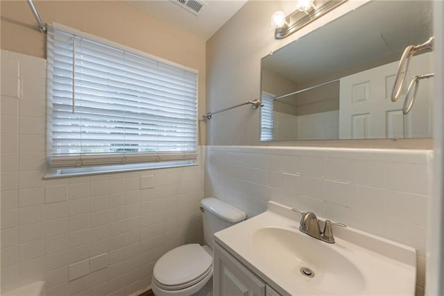 3390 Glenview Cir SW, Atlanta, GA 30331 - bathroom with tile walls, a shower, and vanity