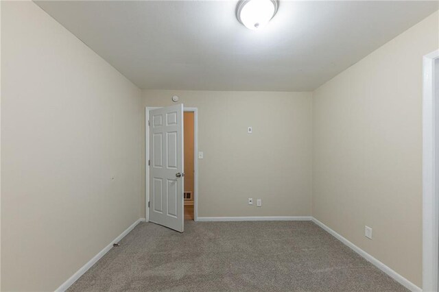 3390 Glenview Cir SW, Atlanta, GA 30331 - spare room with light carpet and baseboards