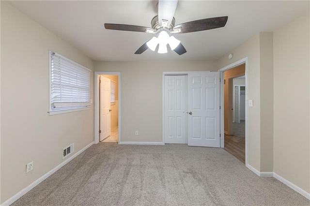 3390 Glenview Cir SW, Atlanta, GA 30331 - unfurnished bedroom with carpet flooring, a closet, ensuite bathroom, and a ceiling fan