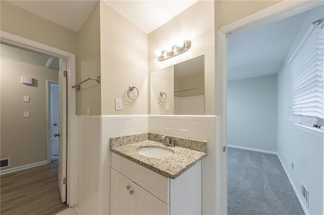 3390 Glenview Cir SW, Atlanta, GA 30331 - bathroom with vanity and tile walls