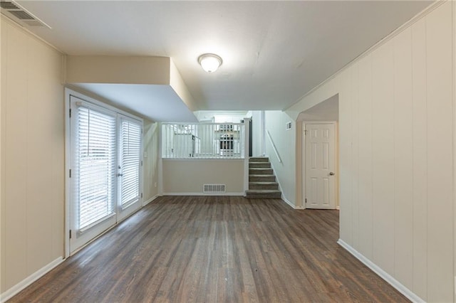 3390 Glenview Cir SW, Atlanta, GA 30331 - unfurnished living room with wood finished floors, healthy amount of natural light, and stairway