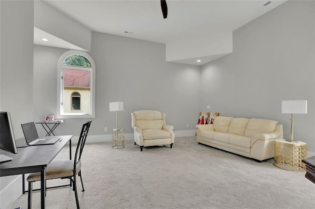 living room featuring light carpet