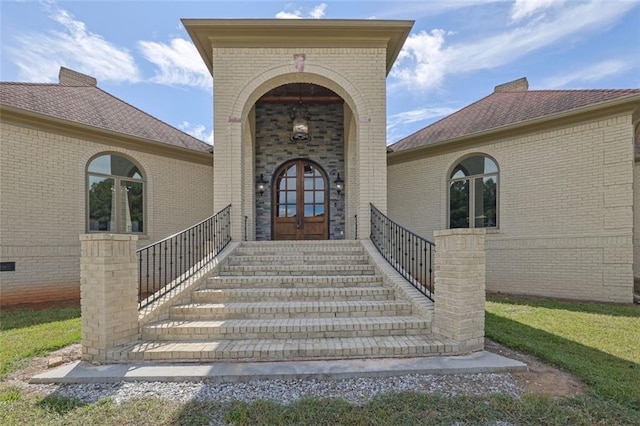 entrance to property featuring french doors