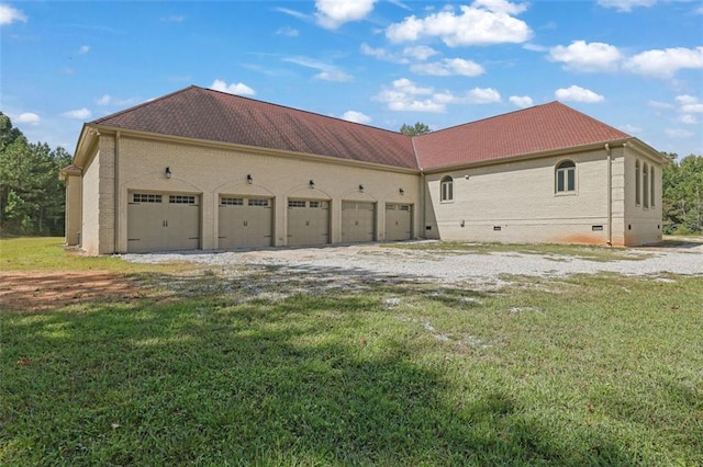 view of home's exterior featuring a yard