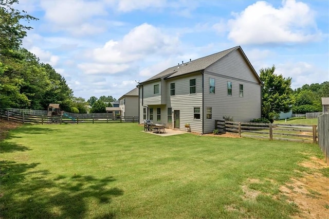 4275 Hunters Walk Way, Cumming, GA 30028 - rear view of house featuring a fenced backyard and a patio area