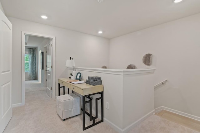 hallway with an upstairs landing, baseboards, recessed lighting, and carpet flooring