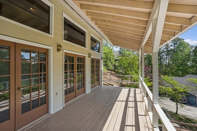 wooden terrace featuring french doors