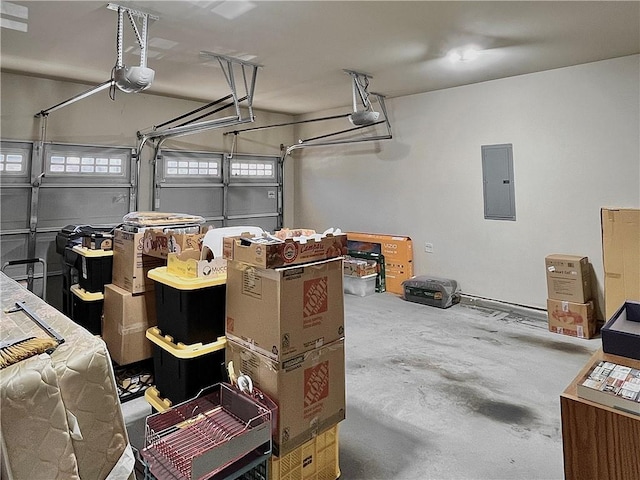 garage with electric panel and a garage door opener