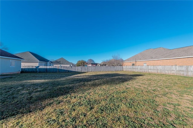 view of yard with fence