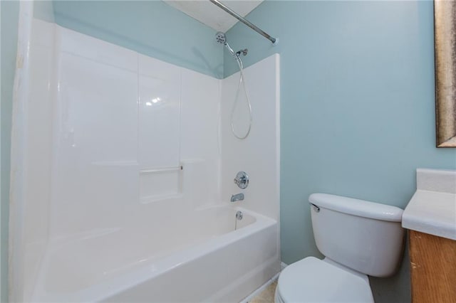 full bathroom featuring bathing tub / shower combination, toilet, and vanity