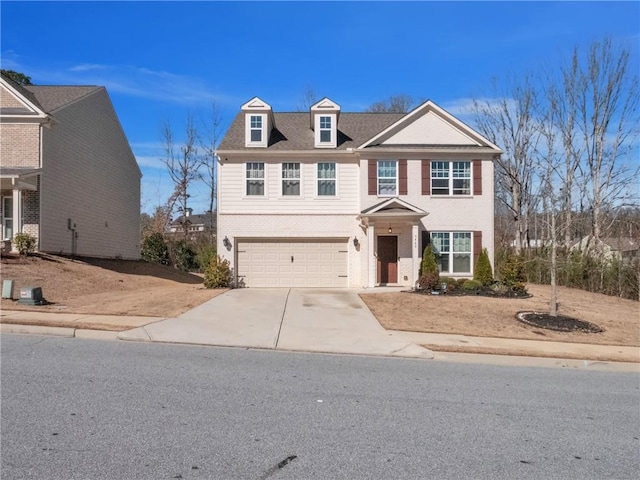 view of front of property featuring a garage