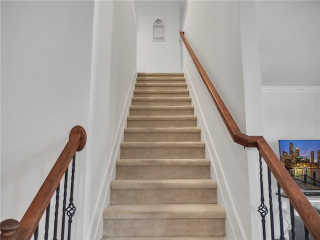 stairs with crown molding