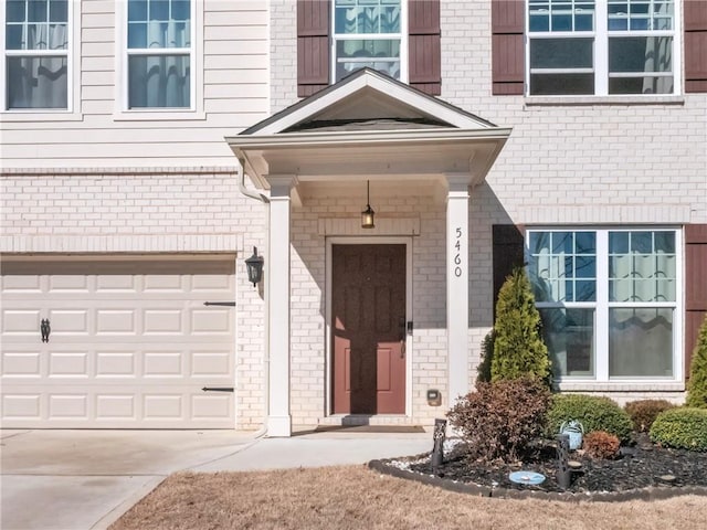 entrance to property featuring a garage