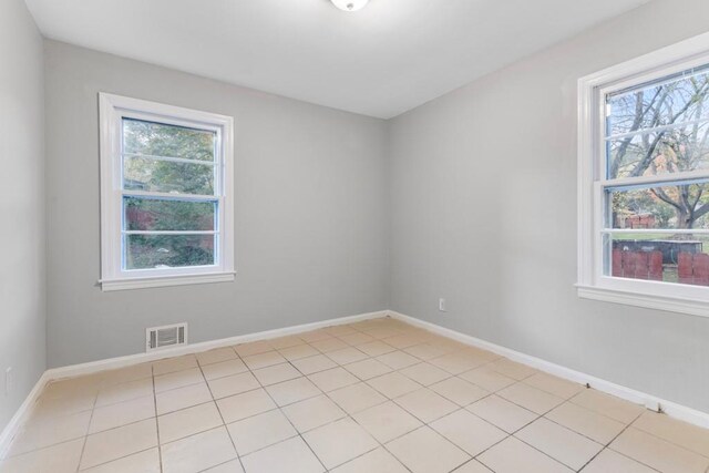 view of tiled spare room